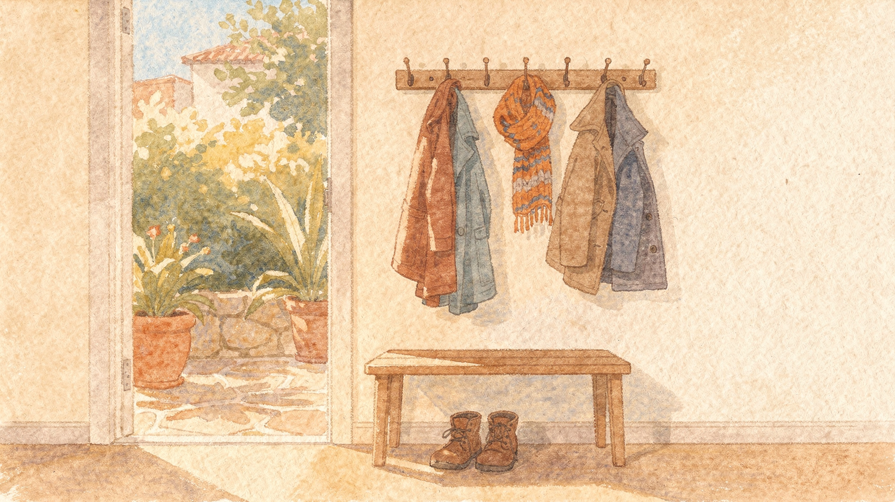 Coats on hooks by an office door, one for each person who needs a login